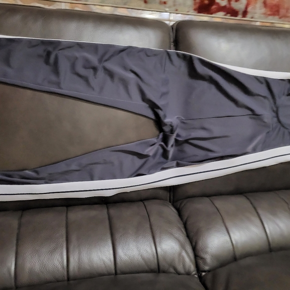 Palm Angels fitted track training jumpsuit in dark grey. - Picture 1 of 16